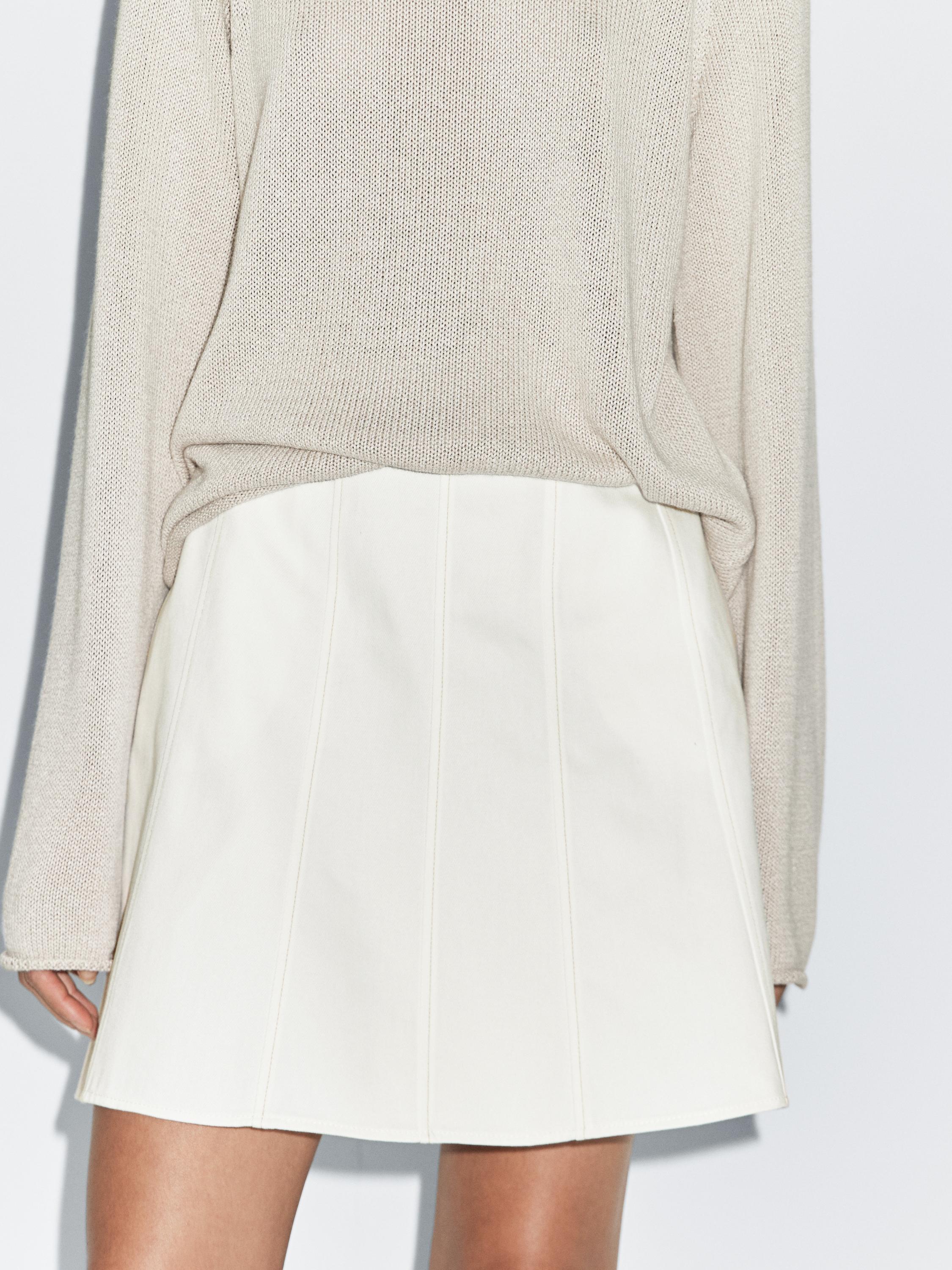 Short denim skirt with seam details